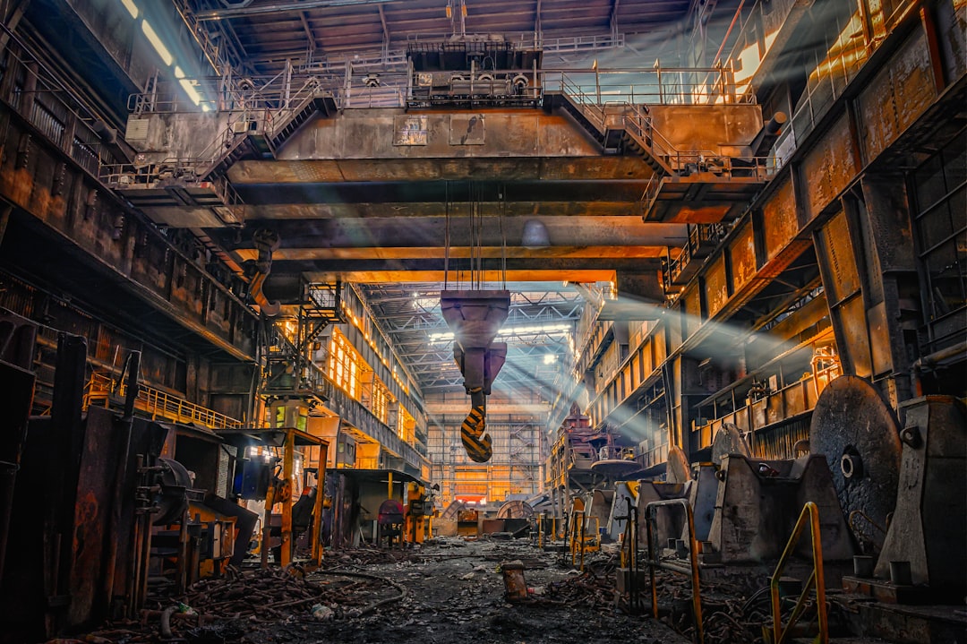Large industrial facility with overhead crane and heavy machinery